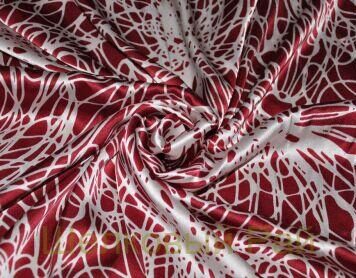 Натуральный шелк: роскошная ткань с мягкой фактурой и изысканным блеском поверхности